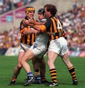 16 August 1998; Billy O'Sullivan of Waterford in action against Canice Brennan, left, and Willie O'Connor of Kilkenny during the Guinness All-Ireland Senior Hurling Championship Semi-Final match between Kilkenny and Waterford at Croke Park in Dublin. Photo by Damien Eagers/Sportsfile