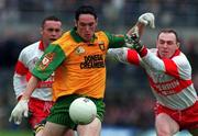 19 July 1998; Brendan Devenney of Donegal in action against Henry Downey of Derry during the Bank of Ireland Ulster Senior Football Championship Final match between Derry and Donegal at St Tiernach's Park in Clones, Monaghan. Photo by Matt Browne/Sportsfile