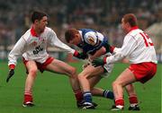 27 September 1998; Brian McCormack of Laois in action against Enda McGinley, left, and Owen Mulligan, right, of Tyrone during the All-Ireland Minor Football Championship Final between Laois and Tyrone at Croke Park in Dublin. Photo by Matt Browne/Sportsfile