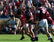 20 September 1998; Brian O'Keeffe of Cork in action against Galway players, from left, Alan Kerins, Michael Healy, and Padraic Walshe, 8, during the All-Ireland U21 Hurling Championship Final match between Cork and Galway at Semple Stadium in Thurles, Tipperary. Photo by David Maher/Sportsfile