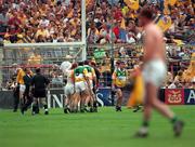 22 August 1998; Offaly players argue with referee Jimmy Cooney after he blew the full-time whistle early at Guinness All-Ireland Hurling All-Ireland Senior Championship Semi-Final Replay match between Clare and Offaly at Croke Park in Dublin. Photo by Ray McManus/Sportsfile