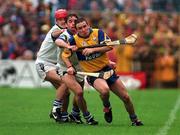 19 July 1998; Colin Lynch of Clare in action against Tony Browne and Stephen Frampton, behind, of Waterford during the Guinness Munster Senior Hurling Championship Final Replay match between Clare and Waterford at Semple Stadium in Thurles, Tipperary. Photo by Ray McManus/Sportsfile