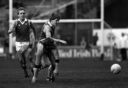 25 October 1987; Brian McGilligan of Ireland, supported by team-mate Ger Lynch, in action against Andrew Jarmon of Australia during the International Rules Series Second Test match between Ireland and Australia at Croke Park in Dublin. Photo by Ray McManus/Sportsfile