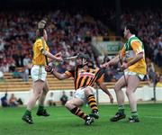 5 July 1998;  DJ Carey of Kilkenny in action against Offaly players Stephen Byrne, left and Kevin Kinahan during the Guinness Leinster Senior Hurling Championship Final match between Kilkenny and Offaly at Croke Park in Dublin. Photo by Ray McManus/Sportsfile