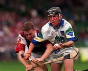 26 July 1998; Dave Bennett of Waterford in action against Gregory Kennedy of Galway during the Guinness All-Ireland Senior Hurling Championship Quarter-Final match between Galway and Waterford at Croke Park in Dublin. Photo by Damien Eagers/Sportsfile