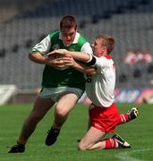 22 August 1998; David Crowe of Leitrim is tackled by Peter O'Neill of Tyrone during the All-Ireland Minor Football Championship Semi-Final between Leitrim and Tyrone at Croke Park in Dublin. Photo by Damien Eagers/Sportsfile