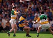 22 August 1998; David Forde of Clare in action against Brian Whelahan, left, and Martin Hanamy of Offaly during the Guinness All-Ireland Hurling All-Ireland Senior Championship Semi-Final Replay match between Clare and Offaly at Croke Park in Dublin. Photo by David Maher/Sportsfile