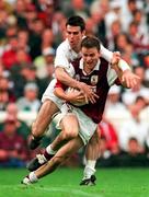 27 September 1998; Derek Savage of Galway is tackled by Ken Doyle of Kildare during the Bank of Ireland All-Ireland Senior Football Championship Final match between Kildare and Galway at Croke Park in Dublin. Photo by Ray McManus/Sportsfile