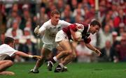 27 September 1998; Derek Savage of Galway in action against John Finn, centre, and Brian Lacey of Kildare  during the Bank of Ireland All-Ireland Senior Football Championship Final match between Kildare and Galway at Croke Park in Dublin. Photo by Brendan Moran/Sportsfile