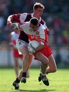 23 August 1998; Eamonn Burns of Derry in action against Michael Donnellan of Galway during the Bank of Ireland All-Ireland Senior Football Championship Semi-Final match between Derry and Galway at Croke Park in Dublin. Photo by Ray McManus/Sportsfile