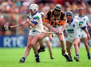 16 August 1998; Fergal Hartley of Waterford  in action against Peter Barry of Kilkenny during the Guinness All-Ireland Senior Hurling Championship Semi-Final match between Kilkenny and Waterford at Croke Park in Dublin. Photo by Matt Browne/SPORTSFILE