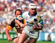 16 August 1998; Fergal Hartley of Waterford  in action against Andy Comerford of Kilkenny during the Guinness All-Ireland Senior Hurling Championship Semi-Final match between Kilkenny and Waterford at Croke Park in Dublin. Photo by Matt Browne/SPORTSFILE