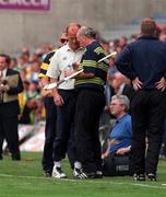 22 August 1998; Offaly manager Michael Bond shows Clare manager Ger Loughnane his stop watch at the end of the game after the full-time whistle was blown early referee Jimmy Cooney at Guinness All-Ireland Hurling All-Ireland Senior Championship Semi-Final Replay match between Clare and Offaly at Croke Park in Dublin. Photo by David Maher/Sportsfile