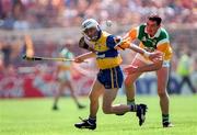 9 August 1998; Ger O'Loughlin of Clare in action against Kevin Kihahan of Offaly during the Guinness All-Ireland Senior Hurling Championship Semi-Final match between Clare and Offaly at Croke Park in Dublin. Photo by Ray McManus/Sportsfile