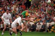 2 August 1998; Hank Traynor of Meath shoots as Kildare players Glenn Ryan and Niall Buckley, left, look on during the Bank of Ireland Leinster Senior Football Championship Final match between Kildare and Meath at Croke Park in Dublin. Photo by Ray McManus/Sportsfile