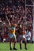 13 September 1998; Offaly captain Hubert Rigney celebrates victory at the final whistle while Seán Ryan Kilkenny looks on after during the Guinness All-Ireland Senior Hurling Championship Final match between Kilkenny and Offaly at Croke Park in Dublin. Photo by David Maher/Sportsfile