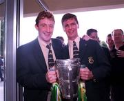 13 September 1998; Offaly captain Hubert Rigney, right, and team-mate Brian Whelahan with the Liam MacCarthy Cup upon the team arrival at the Burlington Hotel after the Guinness All-Ireland Senior Hurling Championship Final match between Kilkenny and Offaly at Croke Park in Dublin. Photo by David Maher/Sportsfile