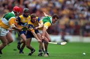 22 August 1998; Kevin Martin of Offaly in action against Jamesie O'Connor of Clare during the Guinness All-Ireland Hurling All-Ireland Senior Championship Semi-Final Replay match between Clare and Offaly at Croke Park in Dublin. Photo by Ray McManus/Sportsfile
