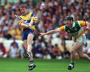 22 August 1998; Jamesie O'Connor Clare in action against Brian Whelahan of Offaly during the Guinness All-Ireland Hurling All-Ireland Senior Championship Semi-Final Replay match between Clare and Offaly at Croke Park in Dublin. Photo by Ray McManus/Sportsfile