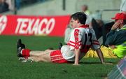 27 August 1998; Joe Brolly of Derry sits on the sideline after he was taken off during the Bank of Ireland All-Ireland Senior Football Championship Semi-Final match between Derry and Galway at Croke Park in Dublin. Photo by Damien Eagers/Sportsfile
