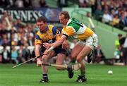22 August 1998; Brian Quinn of Clare in action against Joe Dooley of Offaly during the Guinness All-Ireland Hurling All-Ireland Senior Championship Semi-Final Replay match between Clare and Offaly at Croke Park in Dublin. Photo by David Maher/Sportsfile