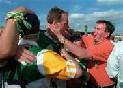 29 August 1998; Joe Dooley of Offaly celebrates with supporters after the Guinness All-Ireland Senior Hurling Championship Semi-Final Refixture match between Clare and Offaly at Semple Stadium in Thurles, Tipperary. Photo by Brendan Moran/Sportsfile