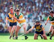 9 August 1998; John Ryan of Offaly in action against Brian Quinn, left, and Seánie McMahon of Clare during the Guinness All-Ireland Senior Hurling Championship Semi-Final match between Clare and Offaly at Croke Park in Dublin. Photo by Ray McManus/Sportsfile