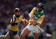 22 August 1998; Johnny Dooley of Offaly in action against Niall Gilligan of Clare during the Guinness All-Ireland Hurling All-Ireland Senior Championship Semi-Final Replay match between Clare and Offaly at Croke Park in Dublin. Photo by Ray McManus/Sportsfile
