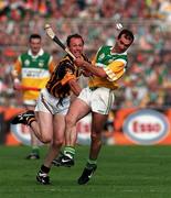 13 September 1998; Johnny Dooley of Offaly in action against Andy Comerford of Kilkenny during the Guinness All-Ireland Senior Hurling Championship Final match between Kilkenny and Offaly at Croke Park in Dublin. Photo by Brendan Moran/Sportsfile