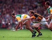 13 September 1998; Johnny Dooley of Offaly, supported by team-mate Joe Dooley, in action against Willie O'Connor of Kilkenny the Guinness All-Ireland Senior Hurling Championship Final match between Kilkenny and Offaly at Croke Park in Dublin. Photo by Ray McManus/Sportsfile