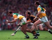 13 September 1998; Johnny Dooley of Offaly, supported by team-mate Joe Dooley, in action against Willie O'Connor of Kilkenny during the Guinness All-Ireland Senior Hurling Championship Final match between Kilkenny and Offaly at Croke Park in Dublin. Photo by Ray McManus/Sportsfile