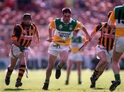 13 September 1998; Johnny Pilkington of Offaly races clear of DJ Carey of Kilkenny during the Guinness All-Ireland Senior Hurling Championship Final match between Kilkenny and Offaly at Croke Park in Dublin. Photo by Ray McManus/Sportsfile