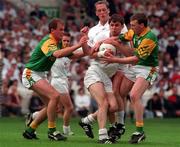 2 August 1998; Karl O'Dwyer of Kildare, supported by team-mate Willie McCreery, behind, in action against John McDermott, left, and Barry Callaghan of Meath during the Bank of Ireland Leinster Senior Football Championship Final match between Kildare and Meath at Croke Park in Dublin. Photo by David Maher/Sportsfile
