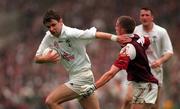 27 September 1998; Karl O'Dwyer of Kildare in action against Seán Óg De Paor of Galway during the Bank of Ireland All-Ireland Senior Football Championship Final match between Kildare and Galway at Croke Park in Dublin. Photo by Ray McManus/Sportsfile