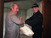 3 September 1998; Kilkenny manager Kevin Fennelly signs a hurley for a kilkenny supporter at a Kilkenny senior hurling squad training session at Nowlan Park in Kilkenny  Photo by David Maher/Sportsfile