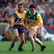 29 August 1998; Kevin Kinahan of Offaly in action against Alan Markham of Clare during the Guinness All-Ireland Senior Hurling Championship Semi-Final Refixture match between Clare and Offaly at Semple Stadium in Thurles, Tipperary. Photo by Ray McManus/Sportsfile