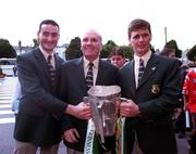 13 September 1998; Offaly manager Michael Bond, centre, team captain Hubert Rigney, right, and full-back Kevin Kinahan with the Liam MacCarthy Cup upon the team arrival at the Burlington Hotel after the Guinness All-Ireland Senior Hurling Championship Final match between Kilkenny and Offaly at Croke Park in Dublin. Photo by David Maher/Sportsfile