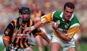 13 September 1998; Kevin Martin of Offaly in action against DJ Carey of Kilkenny during the Guinness All-Ireland Senior Hurling Championship Final match between Kilkenny and Offaly at Croke Park in Dublin. Photo by Brendan Moran/Sportsfile
