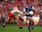 28 September 1998; Kieran Kelly of Laois is tackled by Brendan Donnelly of Tyrone during the All-Ireland Minor Football Championship Final between Laois and Tyrone at Croke Park in Dublin. Photo by Ray McManus/Sportsfile