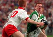 22 August 1998; Michael McGuinness of Leitrim is tackled by Gavin Wylie of Tyrone during the All-Ireland Minor Football Championship Semi-Final between Leitrim and Tyrone at Croke Park in Dublin. Photo by Damien Eagers/Sportsfile