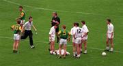 2 August 1998; The Kildare team physio Eamonn Ó Muircheartaigh comes on to attend to Declan Kerrigan during the Bank of Ireland Leinster Senior Football Championship Final match between Kildare and Meath at Croke Park in Dublin. Photo by Damien Eagers/Sportsfile