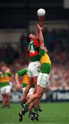 28 September 1997; Liam McHale of Mayo beats Darragh Ó Sé of Kerry to the ball during the Bank of Ireland All-Ireland Senior Football Championship Final between Kerry and Mayo at Croke Park in Dublin. Photo by Brendan Moran/Sportsfile