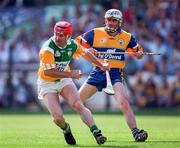 9 August 1998; Martin Hanamy of Offaly in action against Ger O'Loughlin of Clare during the Guinness All-Ireland Senior Hurling Championship Semi-Final match between Clare and Offaly at Croke Park in Dublin. Photo by Ray McManus/Sportsfile