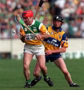 29 August 1998; Martin Hanamy of Offaly in action against Niall Gilligan of Clare during the Guinness All-Ireland Senior Hurling Championship Semi-Final Refixture match between Clare and Offaly at Semple Stadium in Thurles, Tipperary. Photo by Ray McManus/Sportsfile