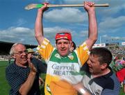 29 August 1998; Offaly's Martin Hanamy celebrates with supporters after the Guinness All-Ireland Senior Hurling Championship Semi-Final Refixture match between Clare and Offaly at Semple Stadium in Thurles, Tipperary. Photo by Ray McManus/Sportsfile