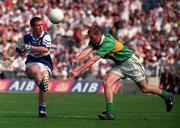 30 August 1998; Michael Clancy of Laois in action against Ronan O'Connor of Kerry during the All-Ireland Minor Football Championship Semi-Final match between Kerry and Laois at Croke Park in Dublin. Photo by Ray Lohan/Sportsfile