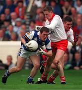 27 September 1998; Michael Clancy of Laois in action against Gavin Devin of Tyrone during the All-Ireland Minor Football Championship Final between Laois and Tyrone at Croke Park in Dublin. Photo by Ray McManus/Sportsfile