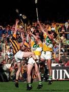 13 September 1998; Peter Barry, left, of Kilkenny in action against Johnny Dooley, right, and Michael Duignan of Offaly during the Guinness All-Ireland Senior Hurling Championship Final match between Kilkenny and Offaly at Croke Park in Dublin. Photo by Brendan Moran/Sportsfile