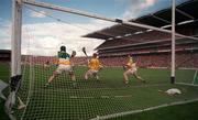 13 September 1998; Offaly goalkeeper Stephen Byrne and team-mates Martin Hanamy, left, and Brian Whelahan watch as DJ Carey's hits his penalty shot over the bar during the Guinness All-Ireland Senior Hurling Championship Final match between Kilkenny and Offaly at Croke Park in Dublin. Photo by Brendan Moran/Sportsfile