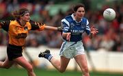 12 October 1997; Olivia Condon of Waterford in action against Linda Farrelly of Monaghan during the All-Ireland Senior Ladies Football Championship Final between Monaghan and Waterford at Croke Park in Dublin. Photo by Matt Browne/Sportsfile
